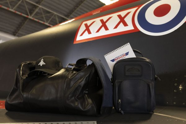 These photos show the sponsors of the Typhoon Display Team (TDT) which include Bags, Watches, Coffee, Tea ect. Flt Lt David "Turbo" Turnbull the TDT  Pilot  displays these items to show off what their sponsors have to offer in 29 Squadrons Hangar on the 23/05/24